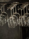 Clear wine glasses on hanging rack