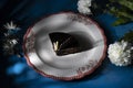 Plate with slice of tasty homemade chocolate cake on table Royalty Free Stock Photo