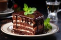 Plate with slice of tasty homemade chocolate cake on table Royalty Free Stock Photo