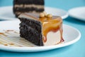 Plate with slice of tasty homemade chocolate cake on table Royalty Free Stock Photo