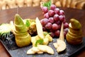 Plate with sliced fruits on servered buffet table at luxury wedding reception indoors, copy space. Royalty Free Stock Photo