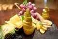 Plate with sliced fruits on servered buffet table at luxury wedding reception indoors, copy space. Royalty Free Stock Photo