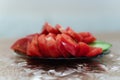 plate with sliced pieces of fresh tomatoes and cucumbers on the table Royalty Free Stock Photo