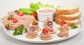 Plate with slices of bread with home made pate, decorated with vegetables Royalty Free Stock Photo