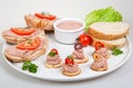 Plate with slices of bread with home made pate, decorated with vegetables Royalty Free Stock Photo