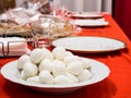 Plate of small fresh Italian mozzarella, for dinner Royalty Free Stock Photo