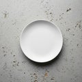 Plate is smooth and unadorned, creating a stark contrast with the weathere Royalty Free Stock Photo
