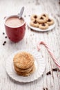 Plate of snickerdoodle cookies and hot chocolate on weathered white wood Royalty Free Stock Photo