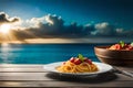 A plate of spaghetti and a bowl of food on a table.