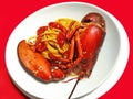 Plate of spaghetti with lobster on red tablecloth Royalty Free Stock Photo