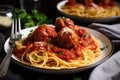 plate of spaghetti and meatballs, ready to be eaten