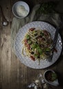 Plate of spaghetti on wooden Table Royalty Free Stock Photo