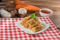 Plate of spring rolls on the table in restaurant Royalty Free Stock Photo