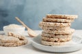 Plate with stack of crunchy rice cakes on table. Royalty Free Stock Photo