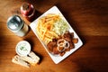 Plate of Steak, Fries and Cabbage on Table Royalty Free Stock Photo