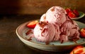 Plate with strawberry ice cream balls Royalty Free Stock Photo