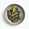 A plate of stuffed grape leaves, isolated on a white background, Royalty Free Stock Photo