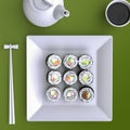 Plate with sushi, chopsticks and tea cup. View from above. Royalty Free Stock Photo