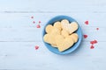 Plate with sweet baking for Valentines day. Shortbread cookies in shape of heart top view. Royalty Free Stock Photo