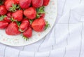 Plate of sweet ripe handpicked strawberry