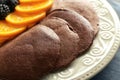 Plate with tasty chocolate pancakes, fruit and berries, closeup