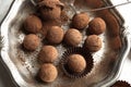Plate with tasty chocolate truffles on table Royalty Free Stock Photo