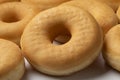 Plate with of tasty sweet traditional donuts close up