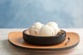 Plate with tasty vanilla ice cream Royalty Free Stock Photo