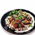 plate of teriyaki chicken isolated on a white background.