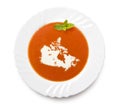 Plate tomato soup with cream in the shape of Canada.(series)