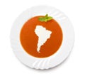 Plate tomato soup with cream in the shape of South America.(series)