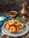 A plate of traditional Moroccan beignets or sfenj.