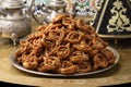 Plate with traditional Moroccan fresh baked chebakia close up for Ramadan