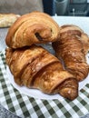 Plate of typical French pastries: croissants and pain au chocolate: Royalty Free Stock Photo