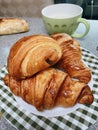 Plate of typical French pastries: croissants and pain au chocolat Royalty Free Stock Photo