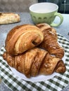 Plate of typical French pastries: croissants and pain au chocolate: Royalty Free Stock Photo