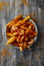 plate with typical german currywurst and chips Royalty Free Stock Photo