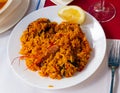 Typical spaish dish seafood paella with mussels, shrimps and rice