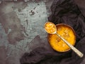 Plate of useful and dietary vegetable soup with a vintage spoon and croutons