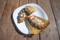 Plate with variety of mexican food.tamal, taco and gordita stuffed