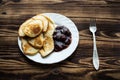 Plate with vegan pancackes with jam fork Royalty Free Stock Photo