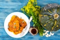 Plate of vegetable fritters, honey