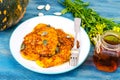 Plate of vegetable fritters, honey