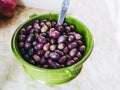 Plate of very tasty and healthy fresh Italian black olives