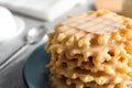 Plate of waffles and condensed milk on table, closeup Royalty Free Stock Photo