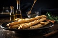 plate of warm, freshly baked breadsticks with extra-virgin olive oil and sea salt