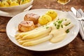 Plate of white asparagus, meat and potatoes Royalty Free Stock Photo