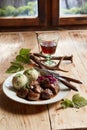 Plate of wild deer venison goulash with dumplings