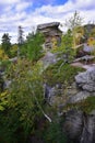 A plateau of sandstone megaliths and the Feathered Guardian rock in the Kamenny Gorod tract