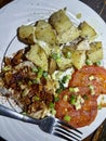 Plated grilled fish dinner with sides. Royalty Free Stock Photo